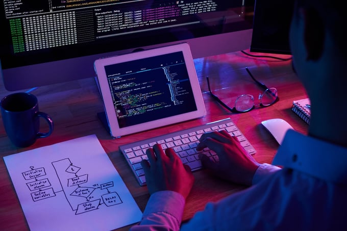 professional-programmer-working-late-dark-office-1